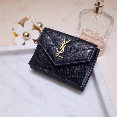 ysl wrist wallet|ysl wallet dupe.